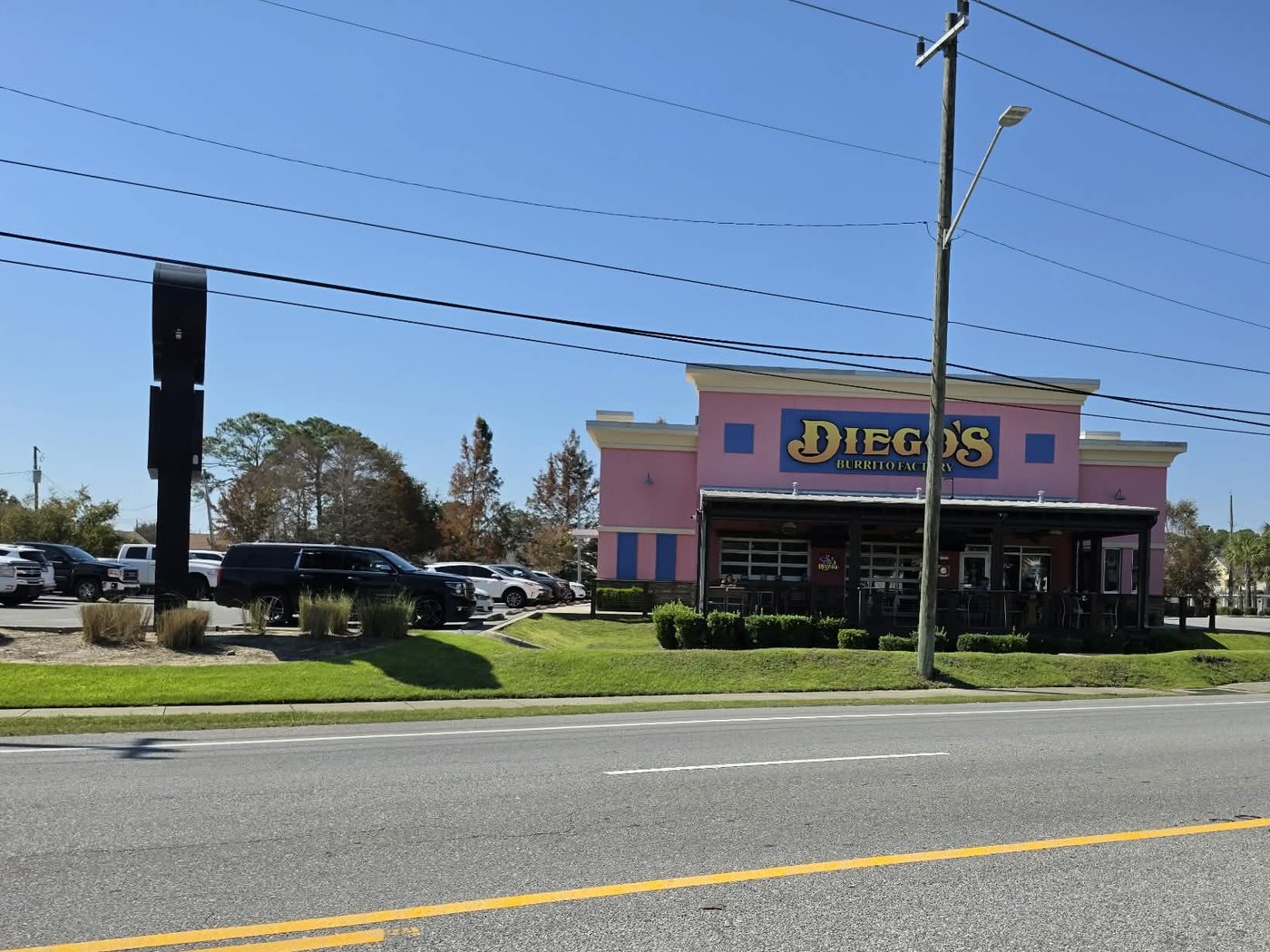 Diego's Burrito Factory on Sunset Drive in Panama City Beach, with its pink building and covered patio