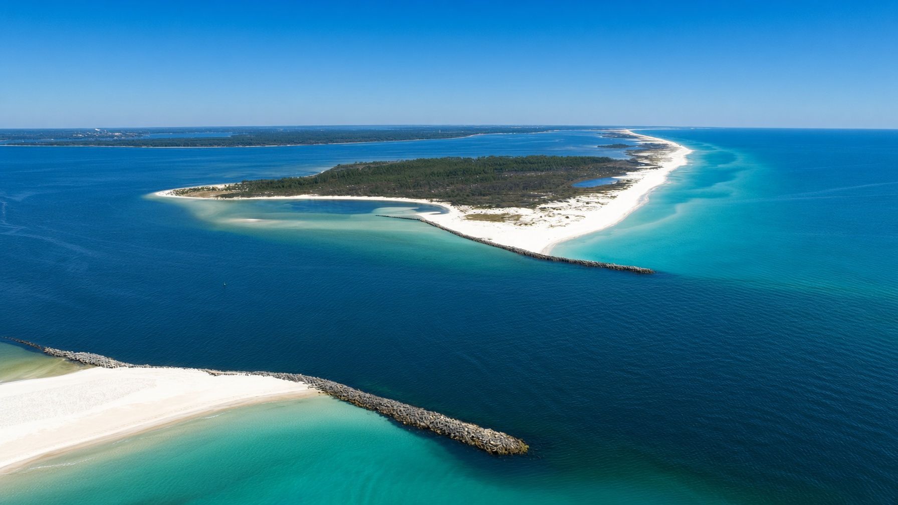Aerial view of Shell Island and the jetties at St. Andrews Pass