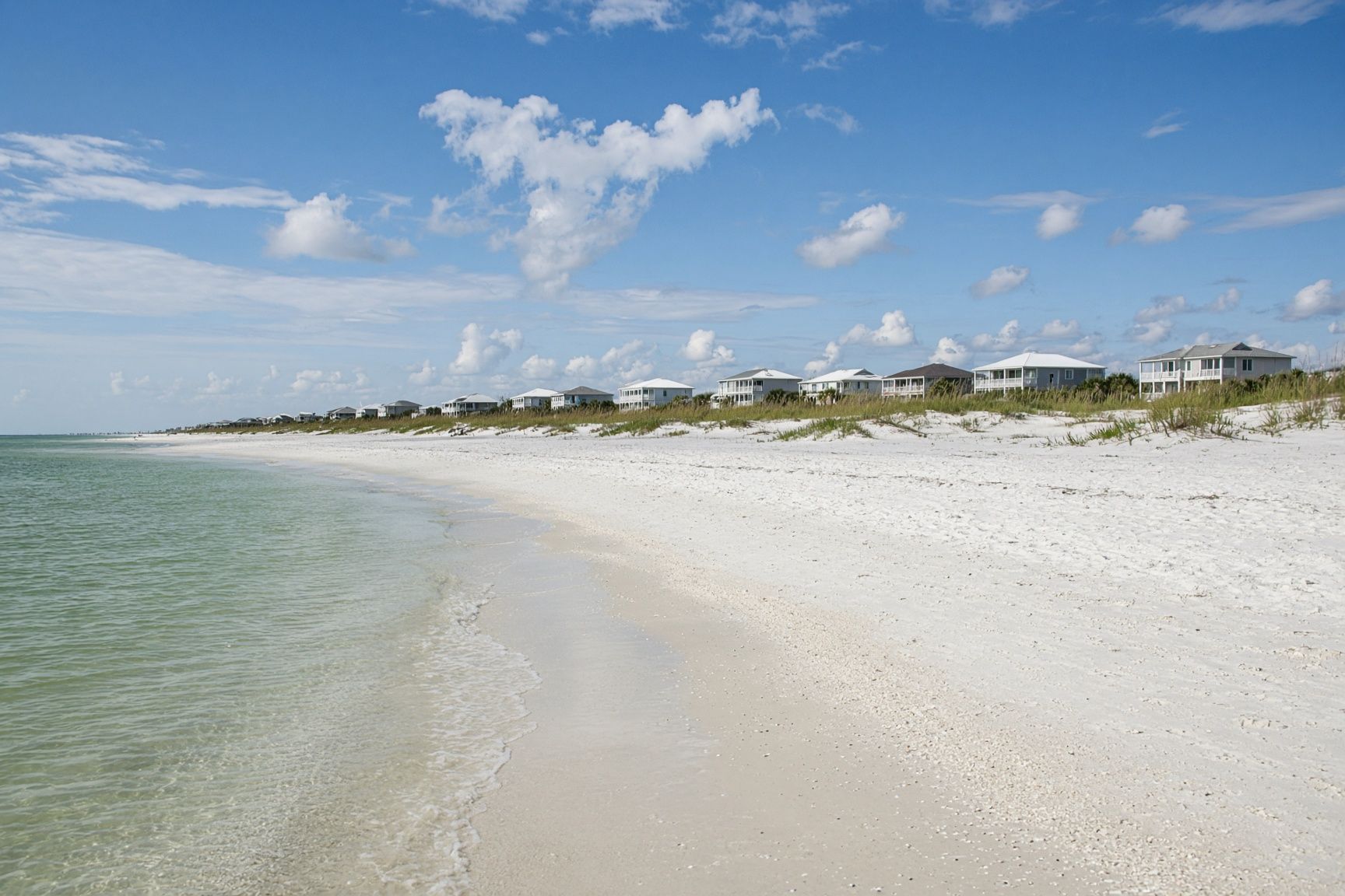 Sugar-white sand and emerald Gulf